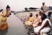 Standing in river Ganges and photographing during a seminar of Eco-Environmental Himalayan Culture organized by Vraja Academy, Vrindavan, at the Maha Kumbha Mela, Hardwar, India, 1986. At far right is Vraja Academy founder Baba Sri Padaji Maharaj. To his right is Vaishnav sage-scholar H.H. Sri Prabhudatta Brahmachariji Maharaja.