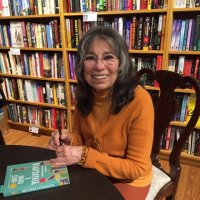 Signing books at book launch of *Once Upon a Yugoslavia* at Main Point Books, Bryn Mawr, Pennsylvania, November 17, 2015.